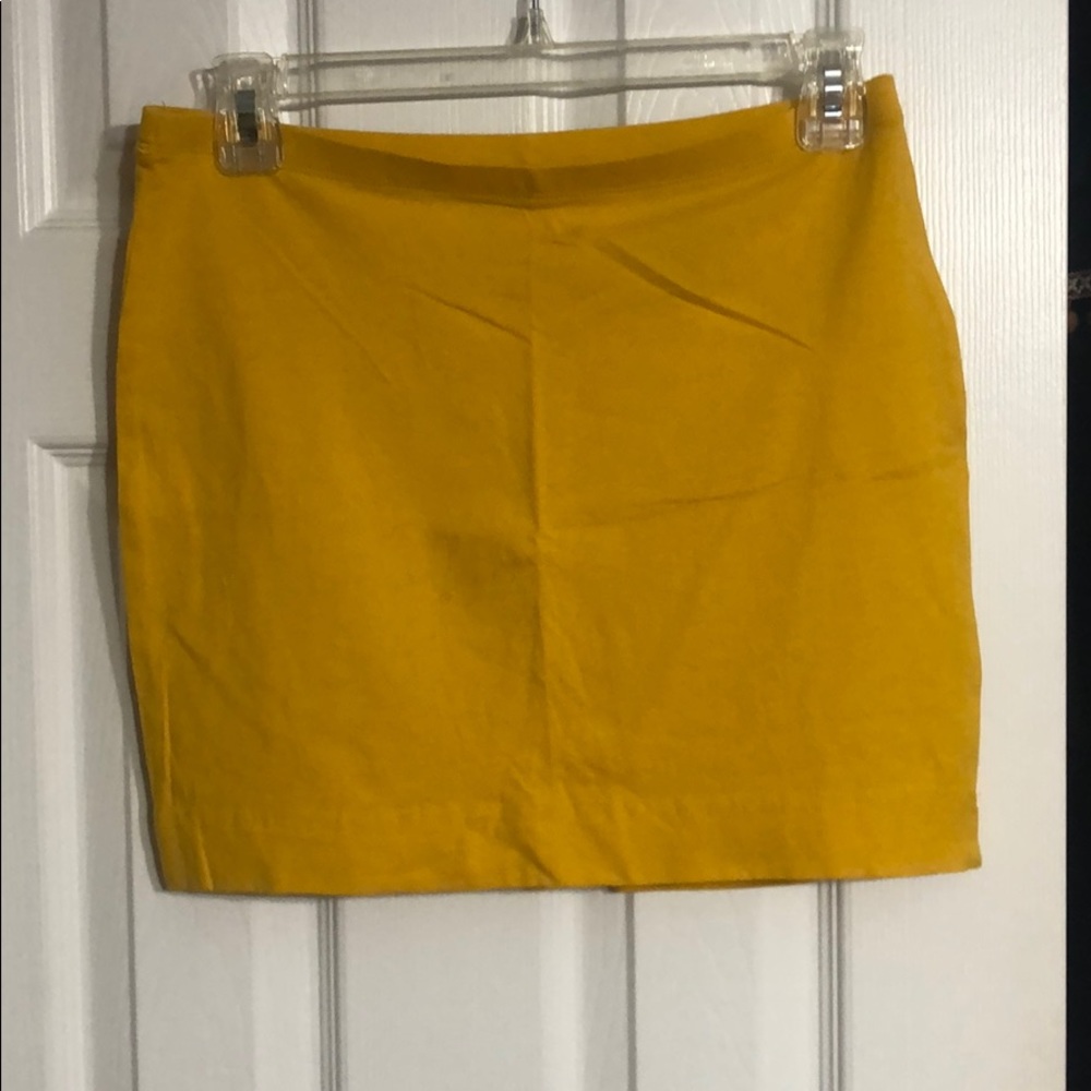 1 black and 1 yellow skirt
